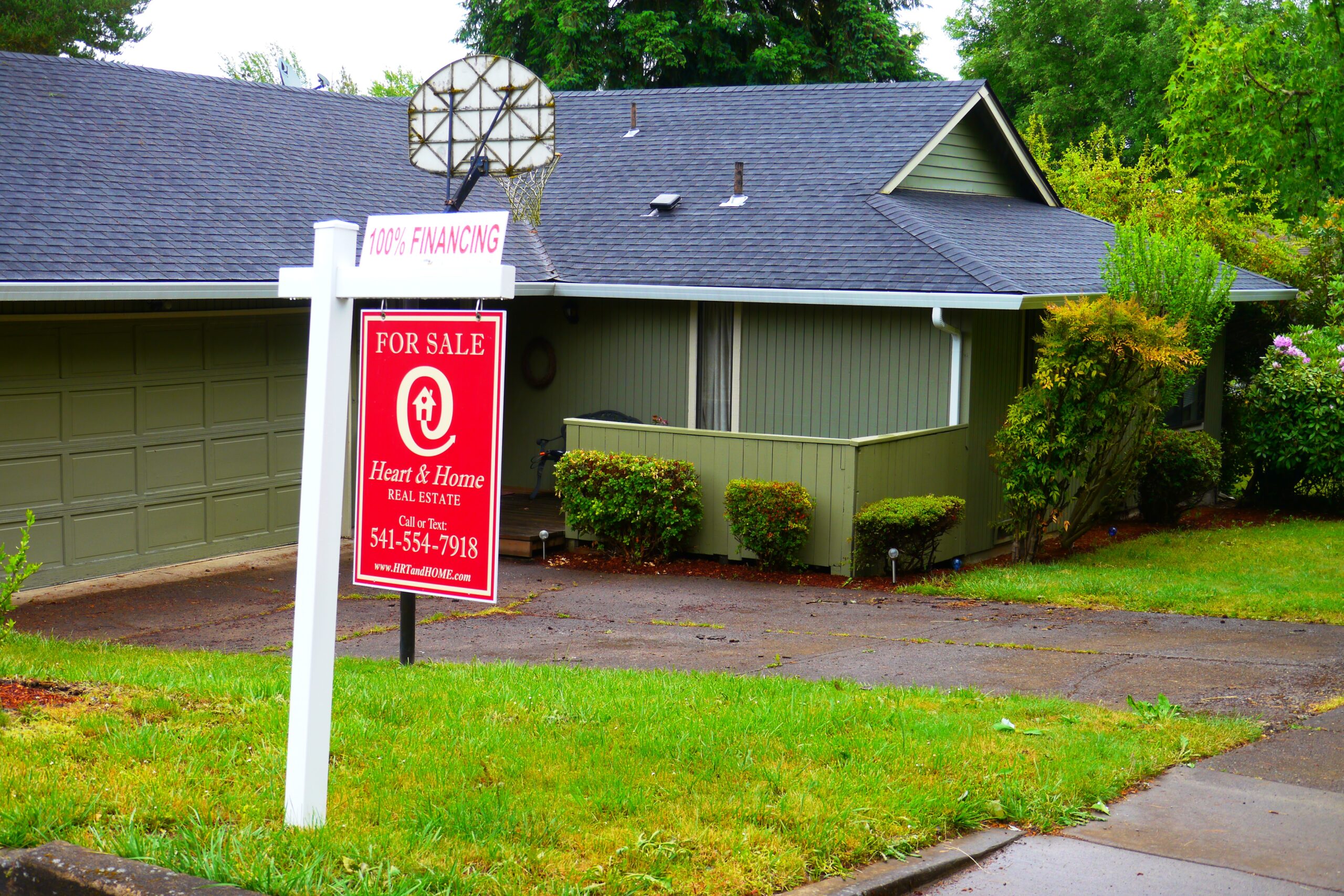 A 'For Sale' sign in front of a house (illustrative file photo)
