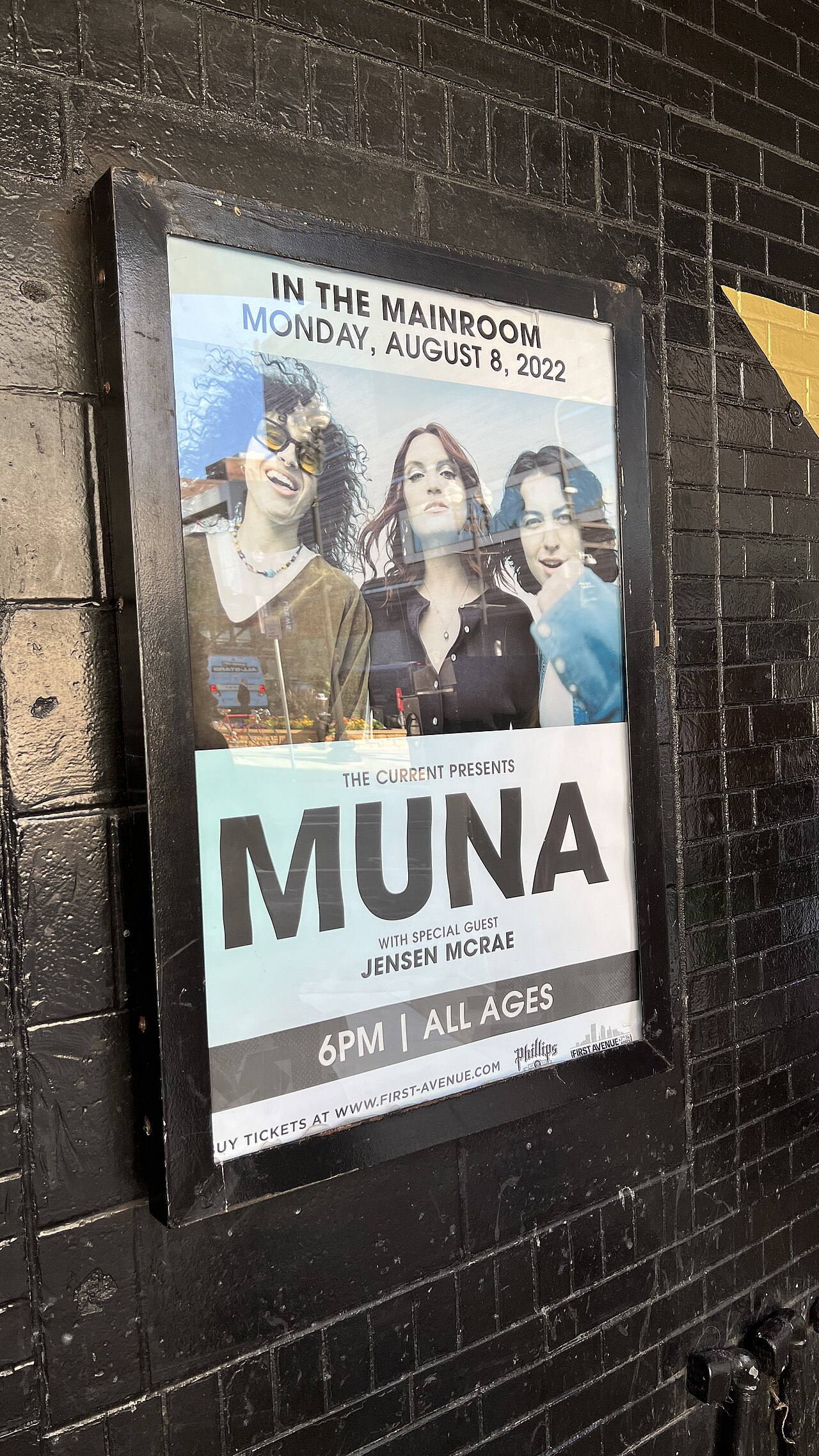 MUNA concert poster from a 2022 performance