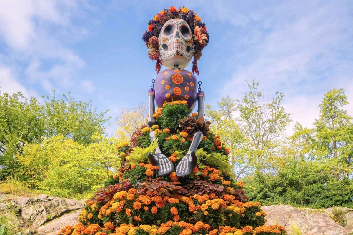 Traditional marigold-adorned La Catrina sculpture displayed at the New York Botanical Garden during its Día de los Muertos celebration in the Bronx