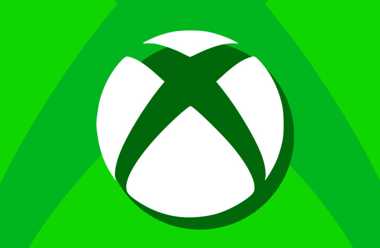 Close up of a premium matte black handheld console chassis displaying an integrated Xbox interface on an OLED screen (Xbox